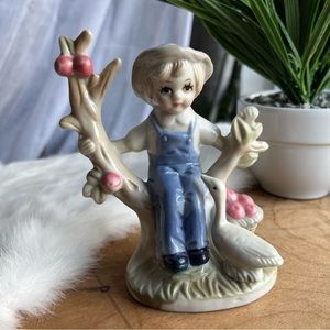 Vintage Porcelain Farm Boy in an Apple Tree with a Goose